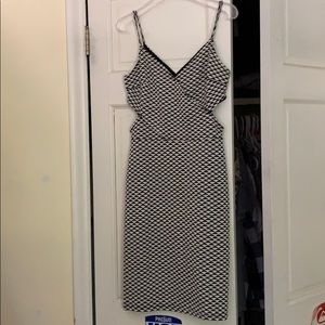 Black and cream bodycon dress with cutouts